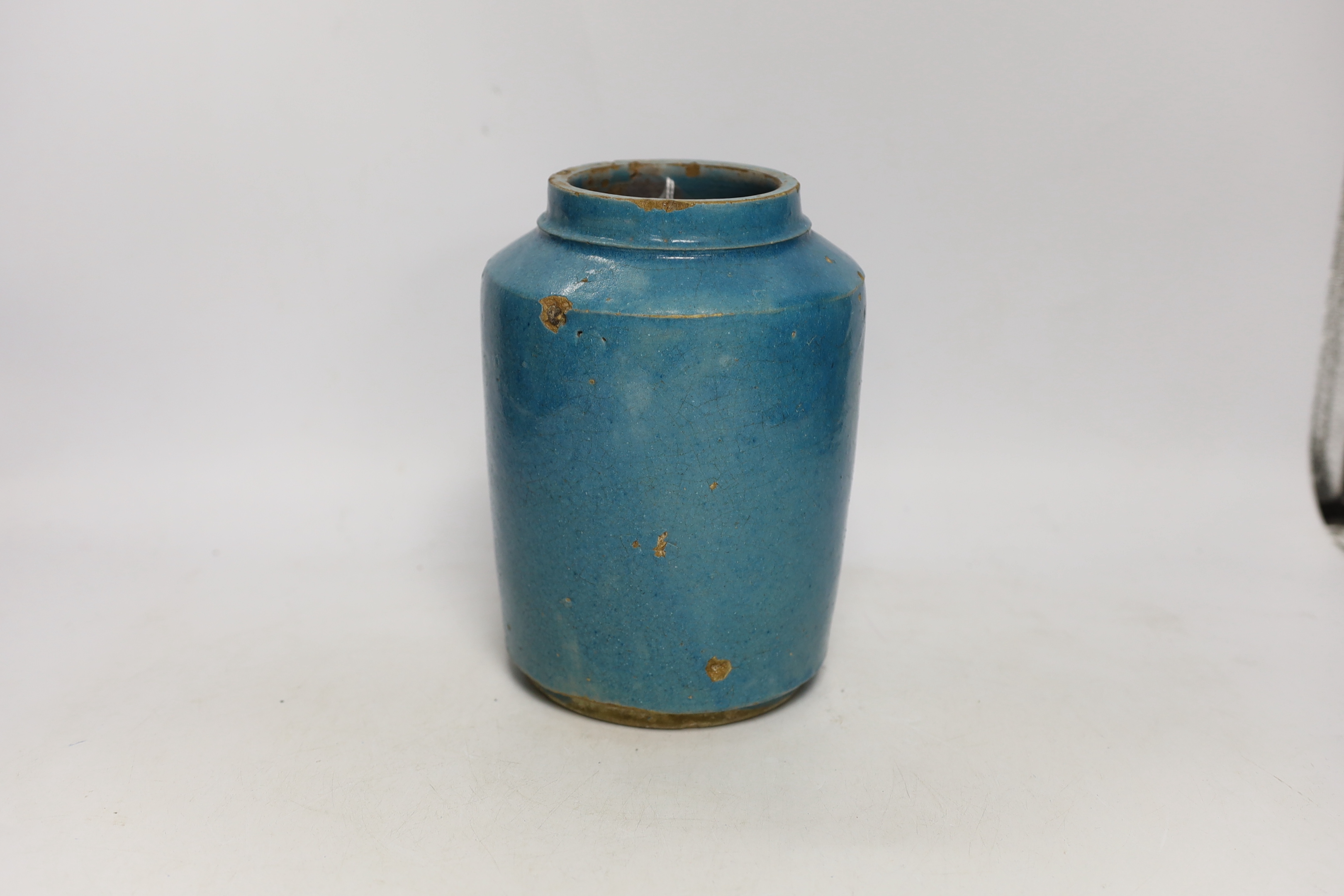 A 19th century Persian turquoise glazed fritware jar, 20cm high